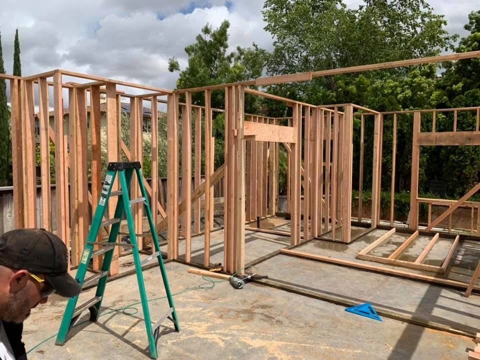 Elusive Construction crew framing interior walls