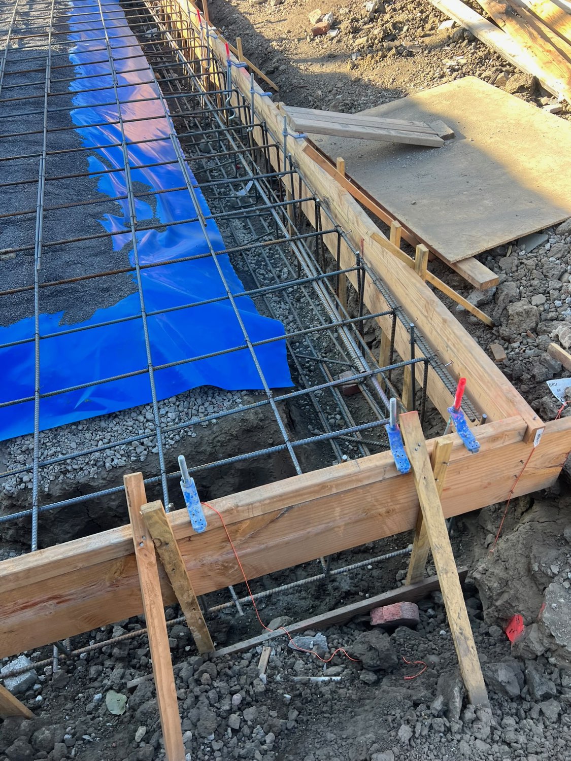 Formed footing with rebar and anchor bolts at a Milpitas home addition