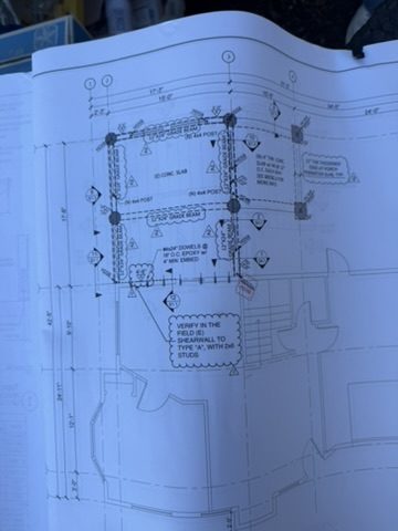 Approved structural plan sheet marking an existing concrete slab to remain